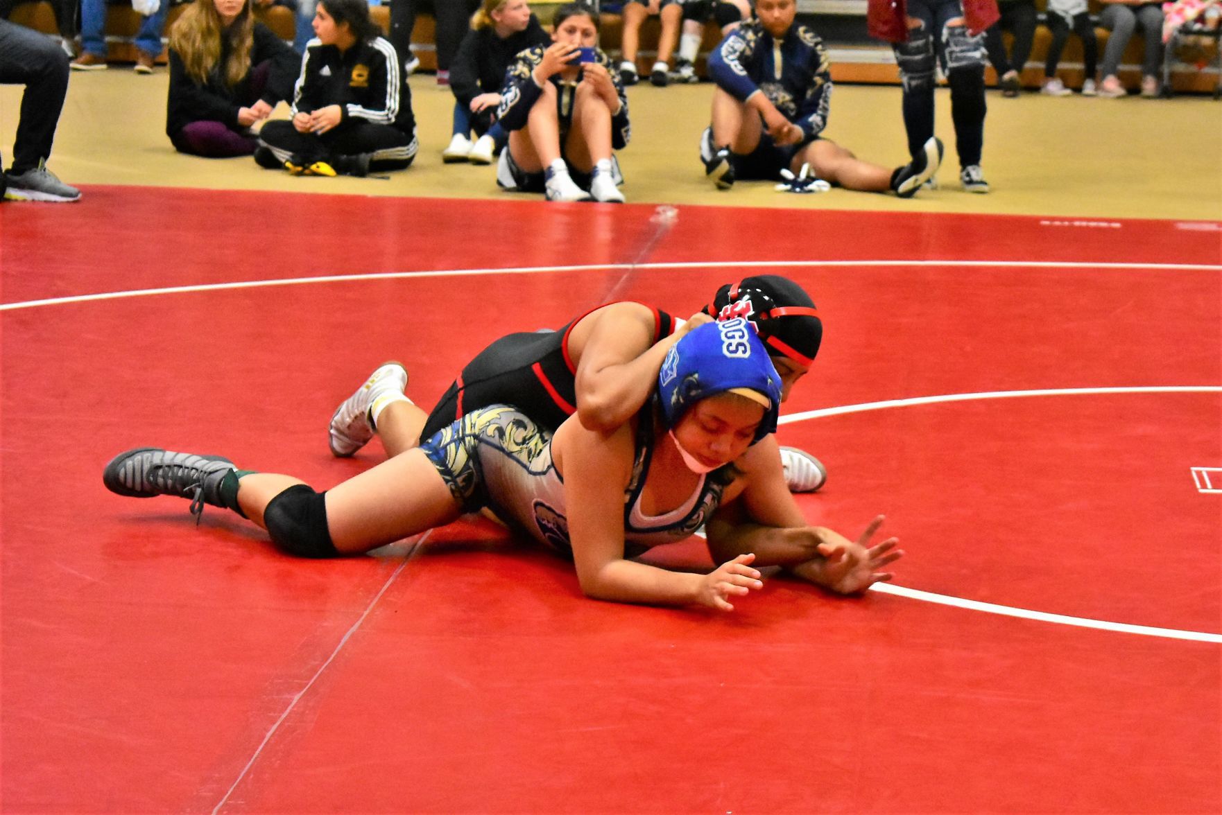 Santa Maria's Jennifer Hernandez trying to pin Golden Valley's Celeste Cubillo